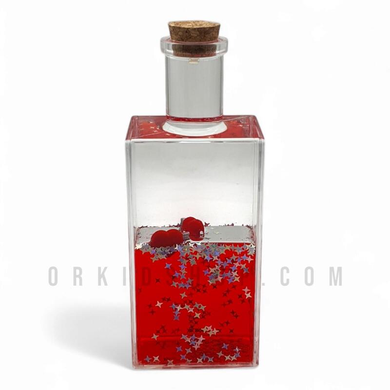 قلب معلق داخل بطری